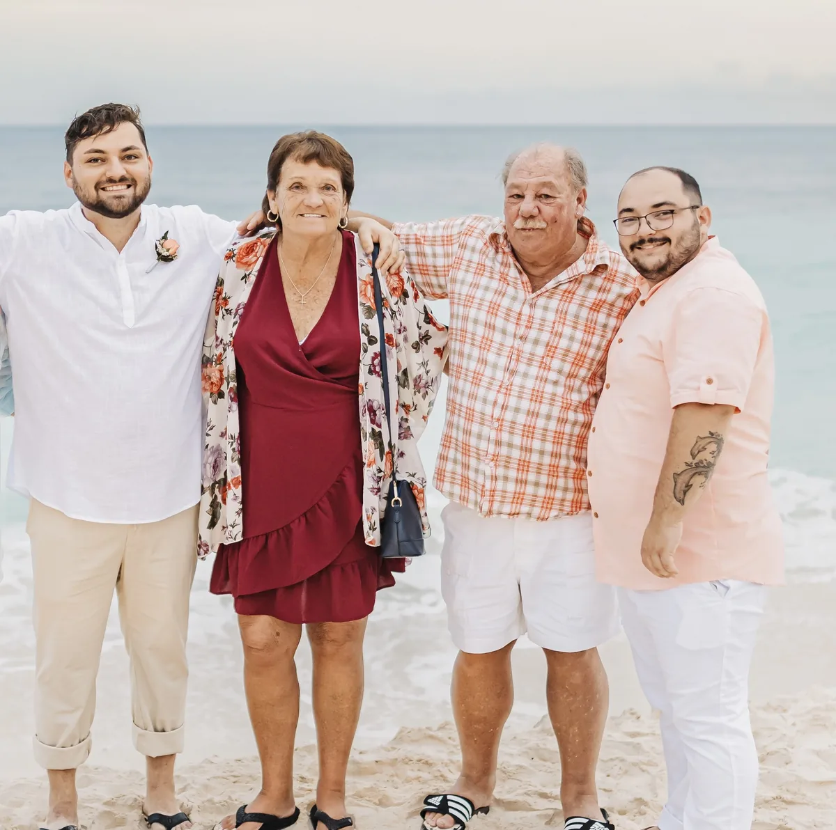Scott with his wife Joanne and grandchildren at the beach